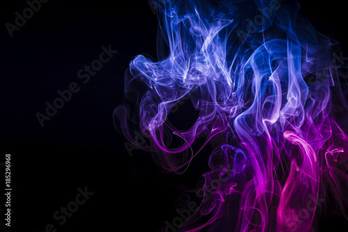 Colored smoke on black background