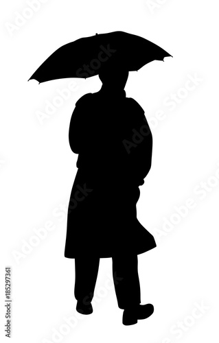 Man in raincoat with umbrella