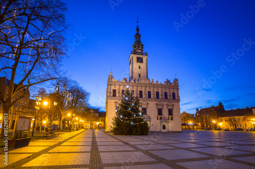 Old town square with historical town hall in Chelmno at dusk, Poland