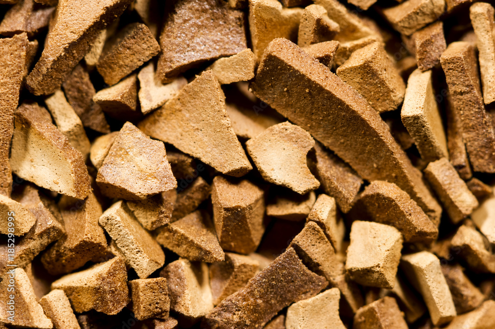 Instant coffee texture, soluble Arabica granules, macro shot, caffeine product, food and drink industry, natural abstract background, selective focus 