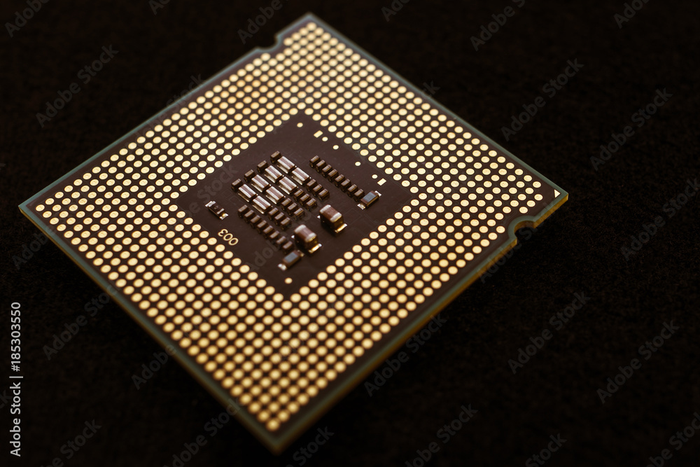 Closeup of an electronic circuit board with a processor. Closeup of an electronic circuit board with a processor.