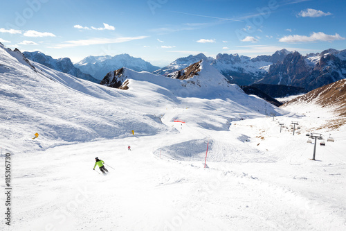 Beautiful ski slope connects Ciampac and Buffaure ski resorts, Val di Fassa valley, Dolomites, Italy