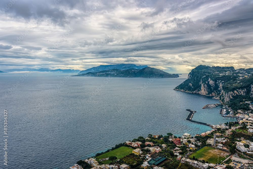 Capri Island view under cloudy sky after storm
