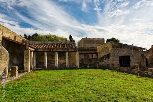 Partially excavated and restored ancient ruins of Herculaneum photo