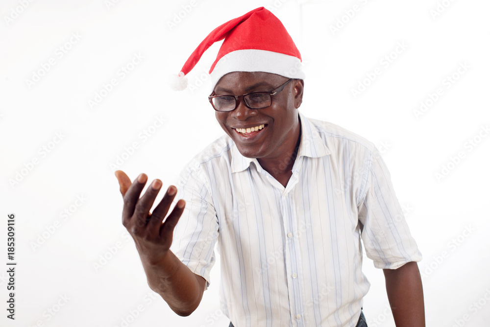 portrait of a happy man wearing a Santa Claus hat