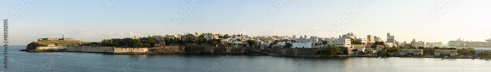 180 degree panorama of old San Juan, Puerto Rico and El Morro fortress at dawn.
