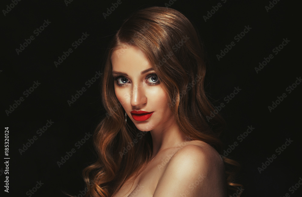 Blonde fashion girl with long and shiny curly hair. Red lips and Blonde fashion girl with long and shiny curly hair. Red lips and