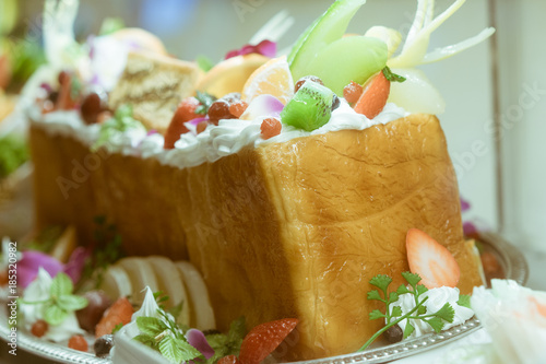 Plastic figure of Japanese toast cake made from slices of wheat toast