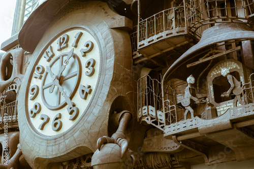 Closeup of the automaton clock Nittele Okokei designed, which hangs on the facade of the Nippon Television headquarters building in Shinbashi district, Minato, Tokyo, Japan.