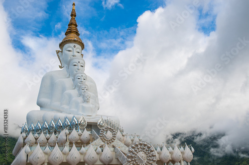 Five Buddha statues sitting at Wat Pha Sorn Kaew Temple or Wat Phra Thart Pha Kaew Temple in Khao Kho, Phetchabun Province, Thailand. photo