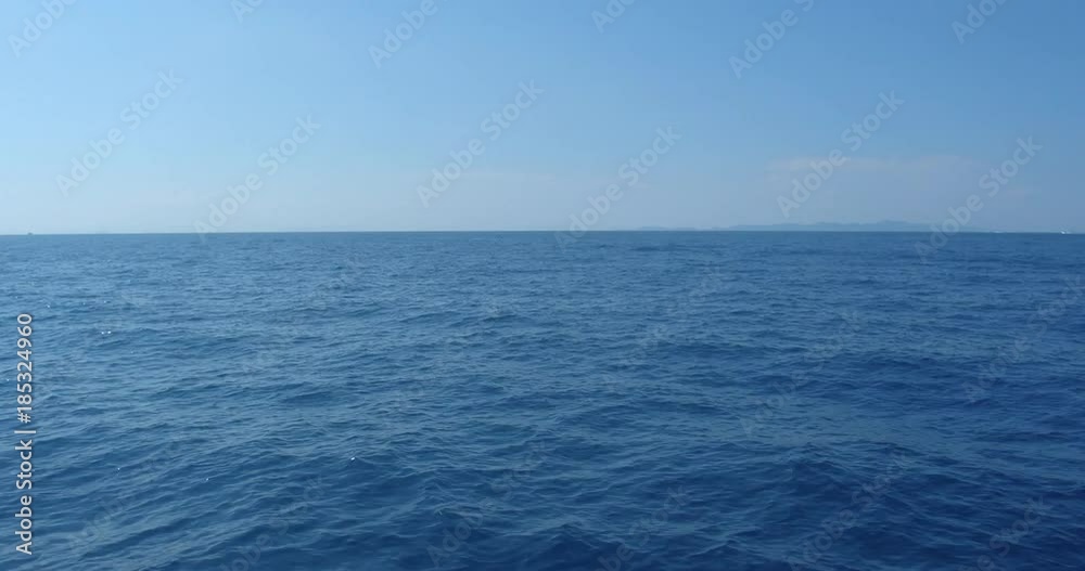 PHUKET, THAILAND, MARCH 2017: View from boat in movement by Phi Phi Islands PHUKET, THAILAND, MARCH 2017: View from boat in movement by Phi Phi Islands