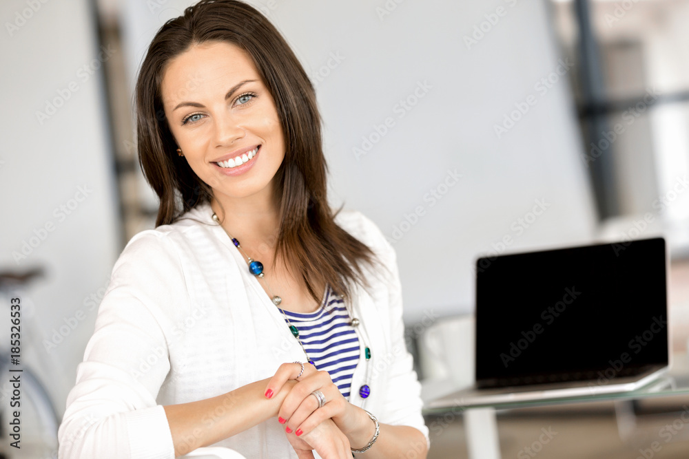 Happy entrepreneur or freelancer in an office or home Happy entrepreneur or freelancer in an office or home