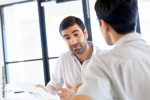 Image of two young business people in office Free Download Image of two young business people in office - GFXLoad
