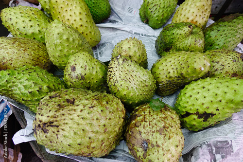 Soursop fruits at local market in Vietnam photo