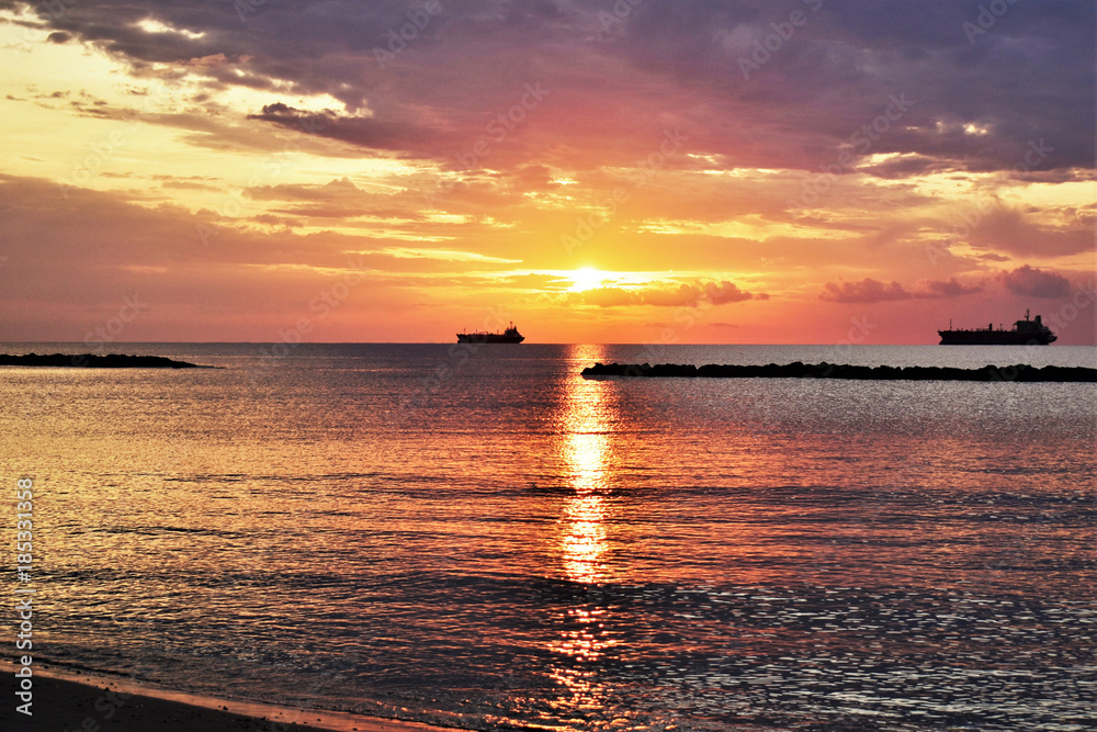 Sunrise over the sea, sun path reflecting on the water, seascape. Sunrise over the sea, sun path reflecting on the water, seascape.