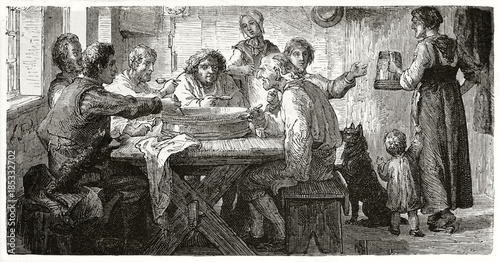 Fényképezés Ancient poor farmers seated on a wooden table eating all from a sole plate in a room