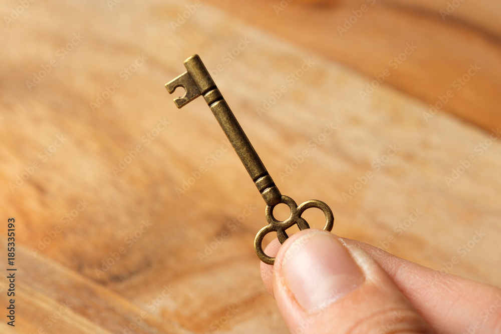 old key on wooden table old key on wooden table