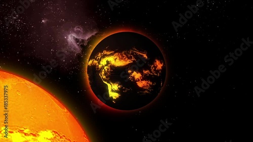 A star with lava flows on the surface rotates in space.