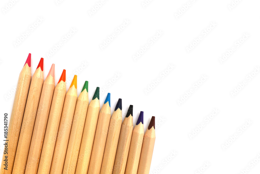 Color pencils on a white background, copy space. Color pencils on a white background, copy space.