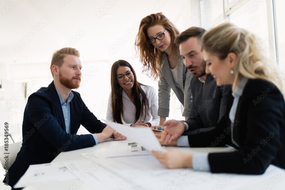 Group of architects working together on project Group of architects working together on project