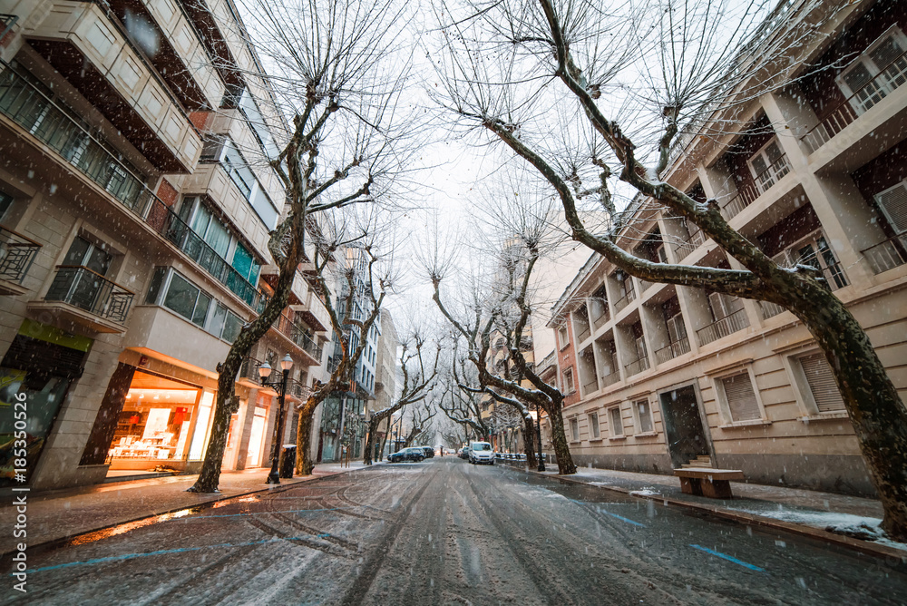 Snowfall in small spanish town Denia in winter
