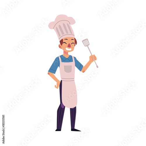 Happy man in chef hat and apron holding turner, cartoon vector illustration isolated on white background. Full length portrait of happy young Caucasian chef in hat and apron holding kitchen turner