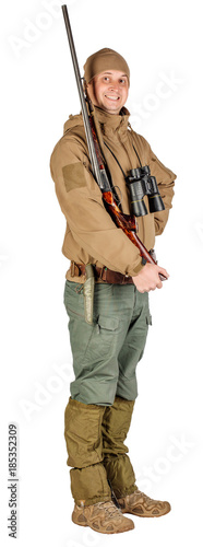 male hunter with double barreled shotgun