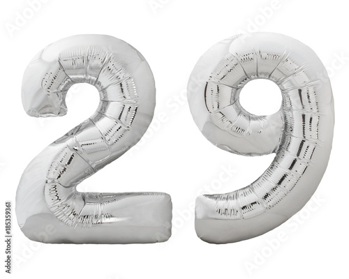 Silver number 29 twenty nine made of inflatable balloon isolated on white photo