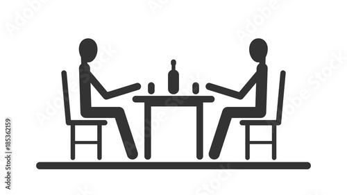 Pictogram two stick figure sitting at the table and to drink out of glasses. 