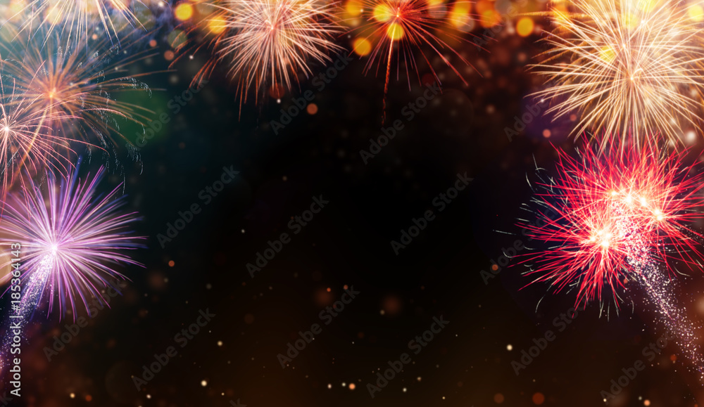 Naklejka premium Abstract colored firework background with free space for text.