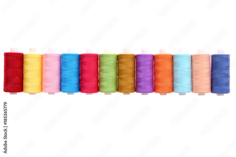 A colorful spool with threads often used in tailoring and is an indispensable element of this profession.
