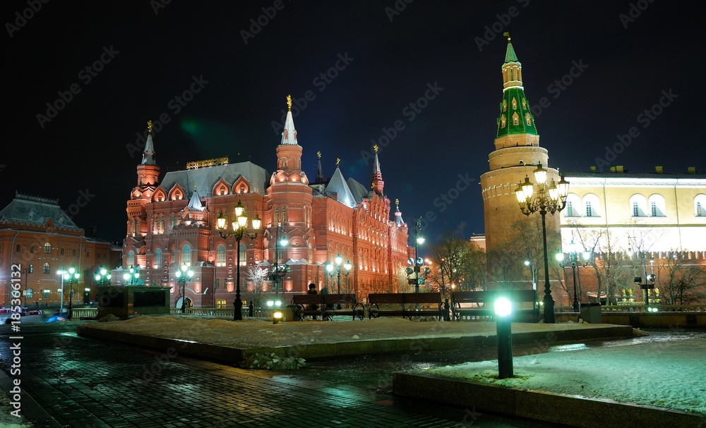 Fototapeta premium View of the Historical Museum near red Square at night. Moscow, Russia/ In Gothic style, of red brick. Taken late evening, before Christmas, festive illumination and decoration of the city