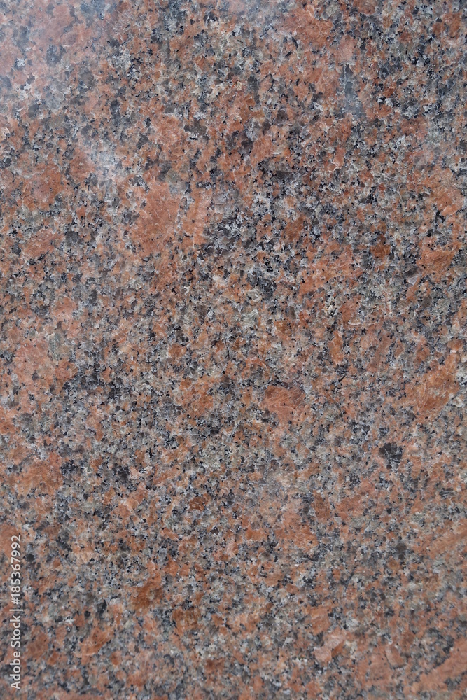 Texture of polished pink and grey granite stone Texture of polished pink and grey granite stone