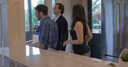 Young couple buying house with realtor