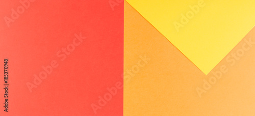 Abstract geometric paper background. Yellow, orange, red colors.
