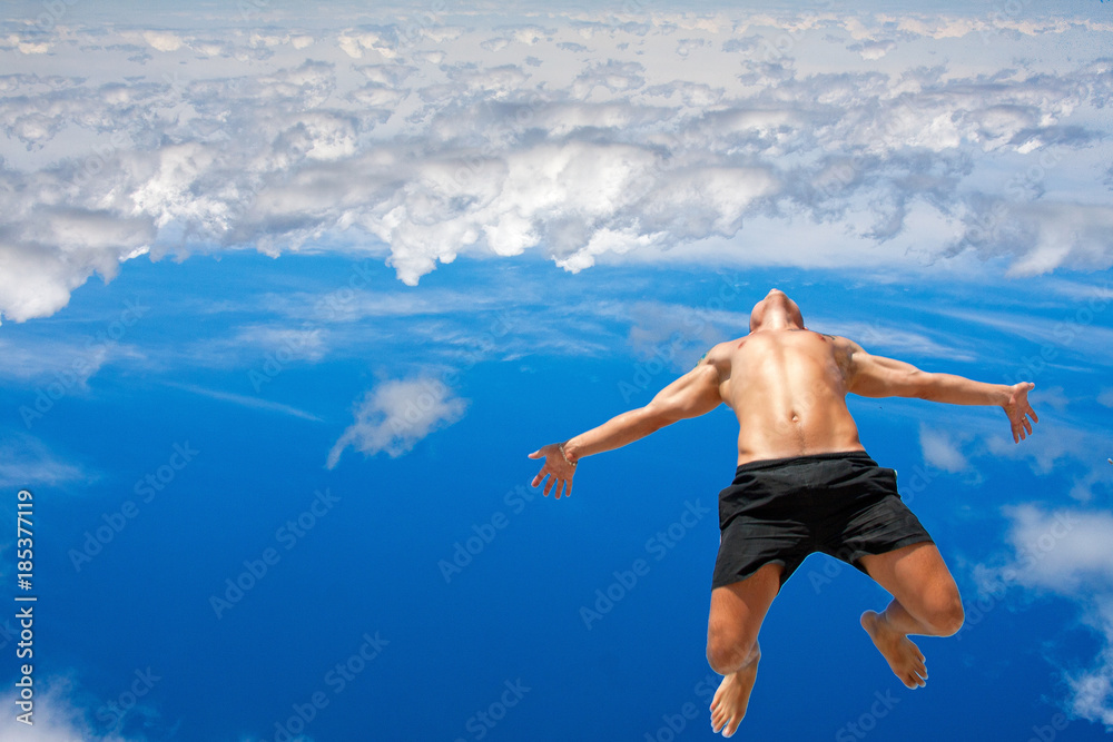 man jumping into the sky