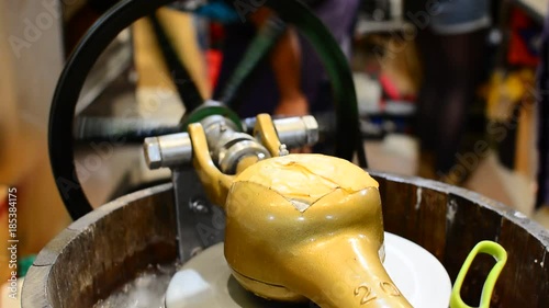 Motorized centrifuge to prepare coconut ice-cream with ice