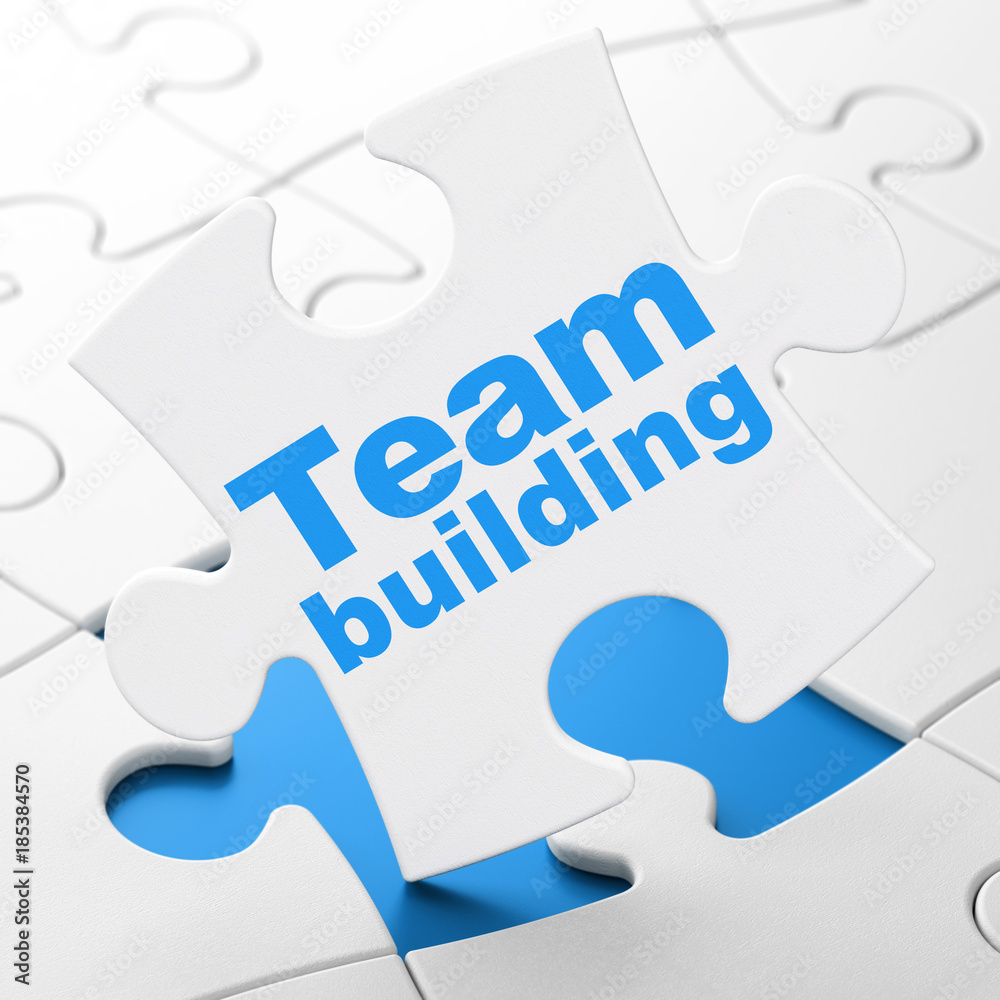 Business concept: Team Building on puzzle background Business concept: Team Building on puzzle background