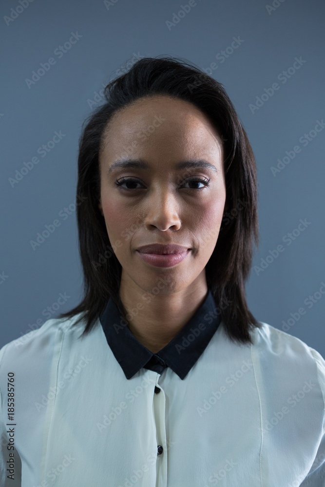 Portrait of female executive smiling in office Portrait of female executive smiling in office