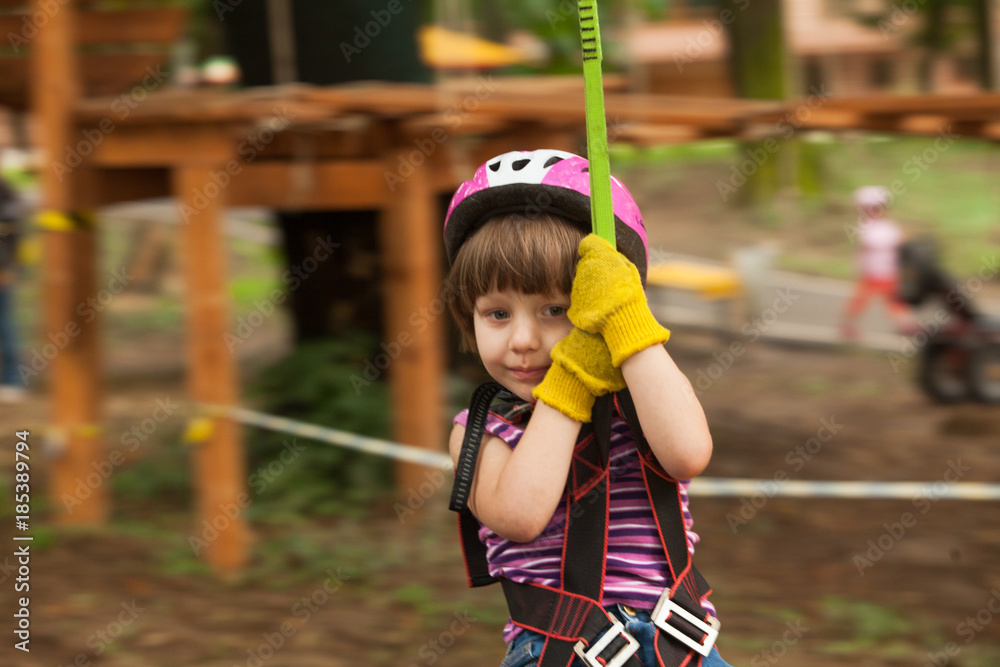 Child in a adventure playground Child in a adventure playground