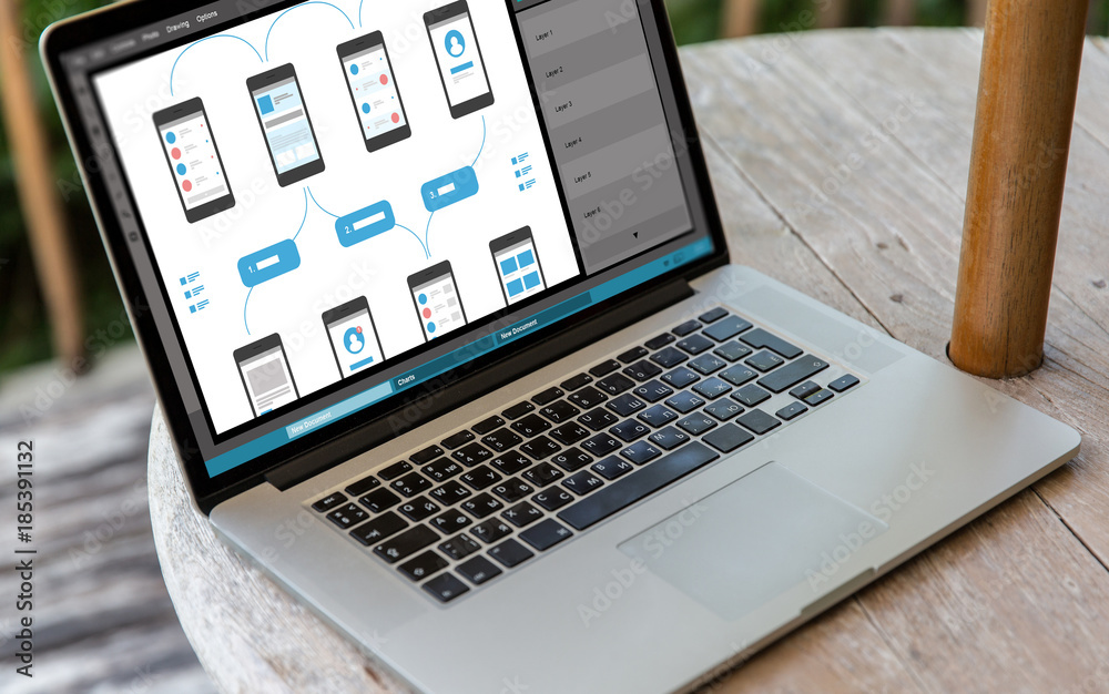 laptop with smartphone interface design on screen laptop with smartphone interface design on screen