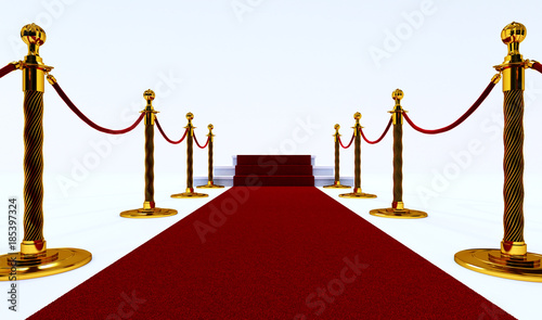 long red carpet between rope barriers with stair at the end
