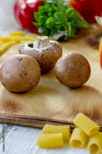 Portobello champignon on a kitchen wooden table