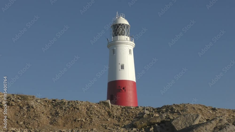 Lighthouse on the stone coast. The Island of Portland. England. Lighthouse on the stone coast. The Island of Portland. England.