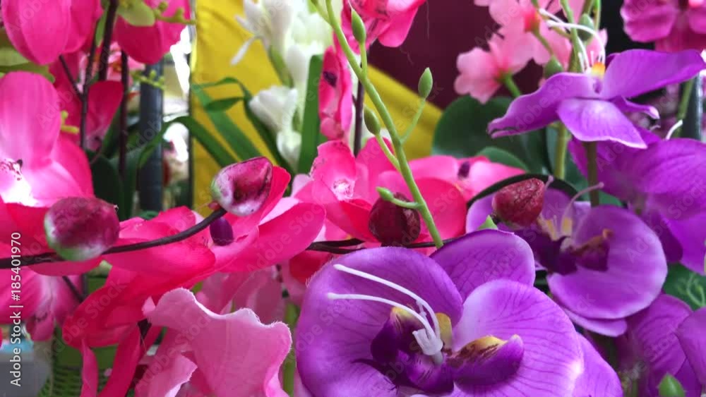 Artificial flower bouquet decor in the shopping mall. Flower store in