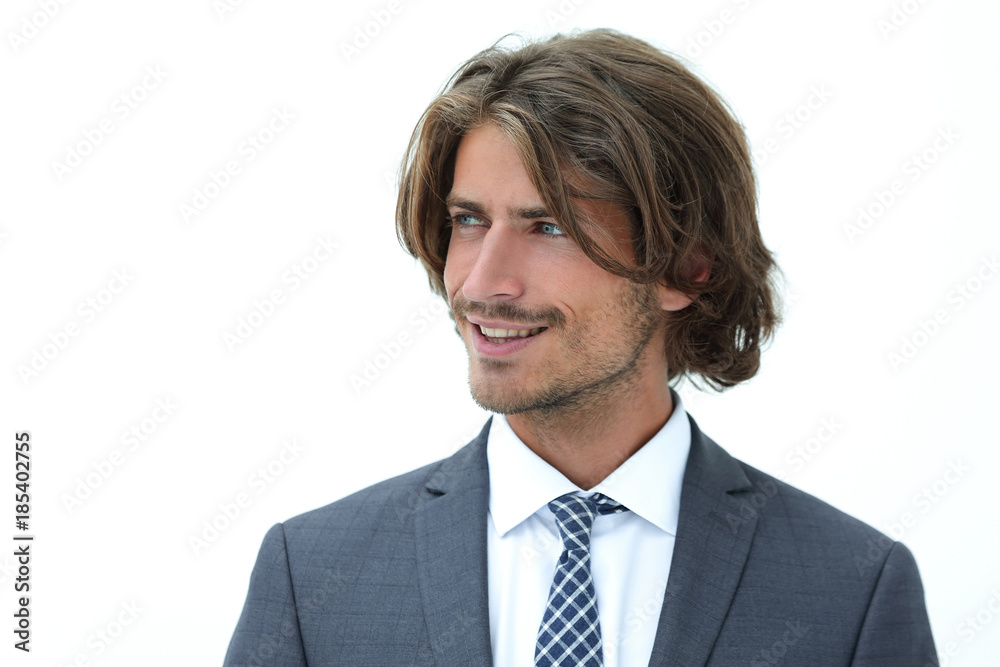 Handsome man in stylish clothes is looking away and smiling Handsome man in stylish clothes is looking away and smiling