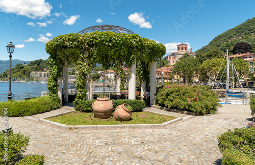 View of Laveno Mombello, is the tourism capital of the eastern shore of Lake Maggiore in province of Varese, Italy photo