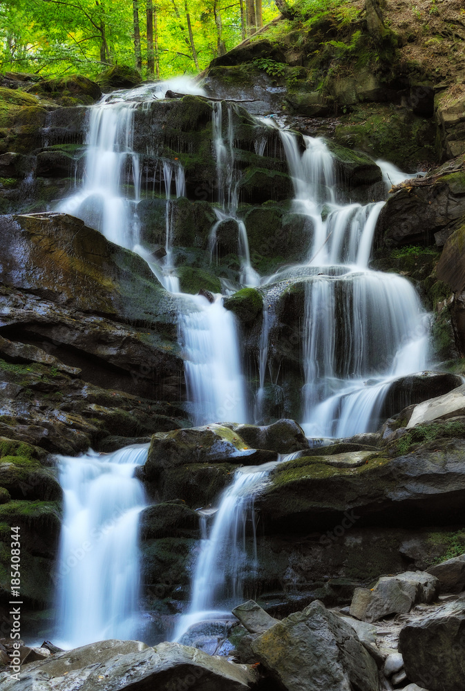 autumn waterfall. Picturesque creek in the Carpathian Mountains autumn waterfall. Picturesque creek in the Carpathian Mountains