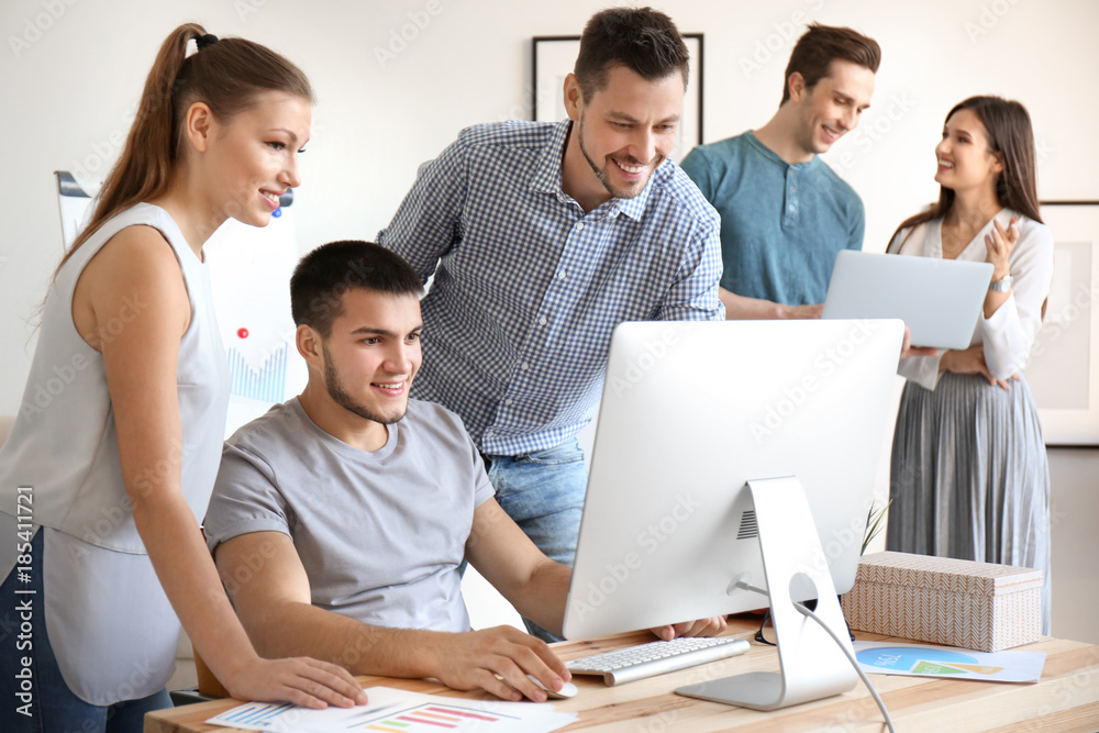 Group of young professionals having meeting in office Group of young professionals having meeting in office
