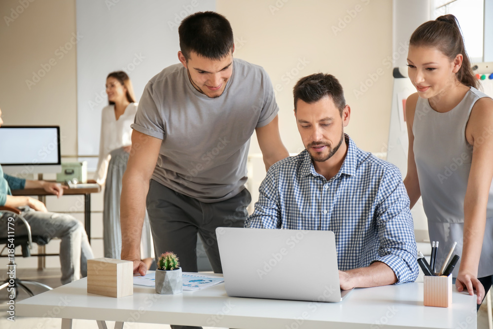 Group of young professionals having meeting in office Group of young professionals having meeting in office